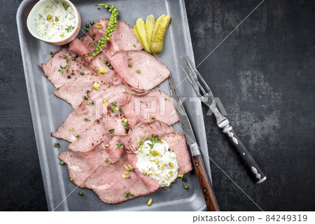 Traditional lunch meat with sliced cold cuts roast beef and remoulade Traditional lunch meat with sliced cold cuts roast beef and remoulade 84249319