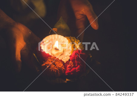 Varanasi Worship Ceremony, a Hindu Sanctuary in North India Praying flowers and candles to the Ganges at Pujar Varanasi Worship Ceremony, a Hindu Sanctuary in North India Praying flowers and candles to the Ganges at Pujar 84249337