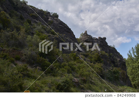 Mountain that looks like a giant sleeping 84249908