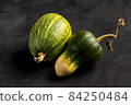 Green pumpkin isolated on black background 84250484
