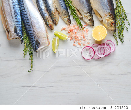 World seafood day. Composition with fresh herring, smelt and mackerel. World seafood day. Composition with fresh herring, smelt and mackerel. 84251800