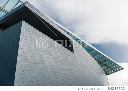 Abstract lines, shapes and colors of the Docks Bruksel Shopping mall, Brussels, Belgium, November 2017 Abstract lines, shapes and colors of the Docks Bruksel Shopping mall, Brussels, Belgium, November 2017 84252312