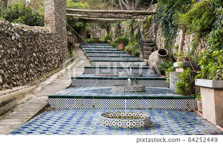 Esporles, Mallorca - Spain - 12 26 2017: Cascade fountain at the gardens of the la Granja, The Farm museum Esporles, Mallorca - Spain - 12 26 2017: Cascade fountain at the gardens of the la Granja, The Farm museum 84252449