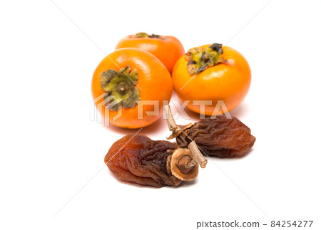 Dried persimmon. Homemade japanese dried fruit. Healthy food. Selective focus. Dried persimmon. Homemade japanese dried fruit. Healthy food. Selective focus. 84254277