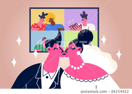 Couple kiss having online wedding ceremony with guests Couple kiss having online wedding ceremony with guests 84254922
