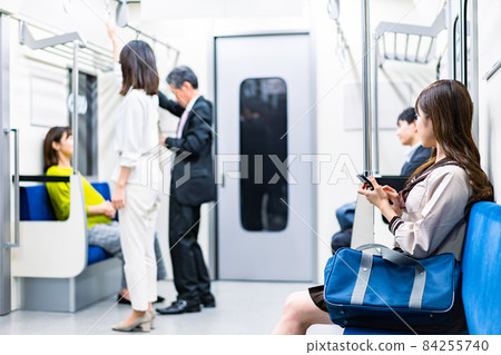 People traveling by train or subway People traveling by train or subway 84255740