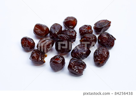 Sweet chinese jujube dessert on white background. Sweet chinese jujube dessert on white background. 84256438