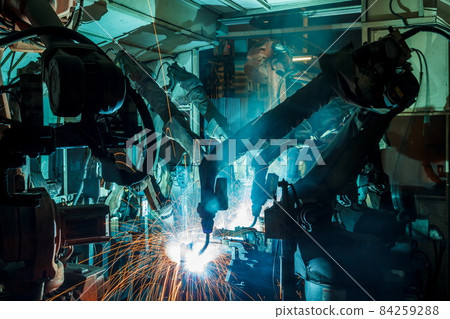 Welding robots movement in a car factory 84259288