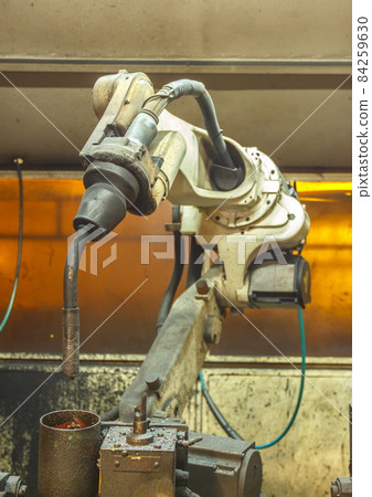 Robots welding team in the automotive 84259630
