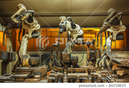 Robots welding team in the automotive 84259635