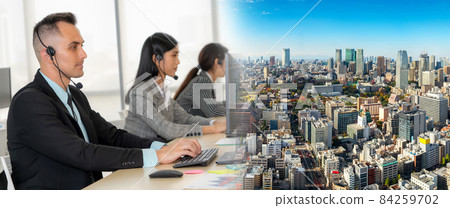 Business people wearing headset working in office broaden view 84259702