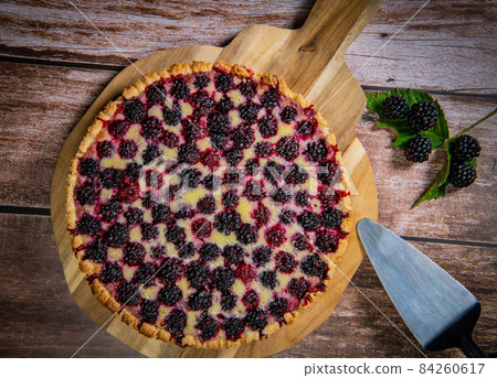 Homemade pie closeup on blackberries. 84260617