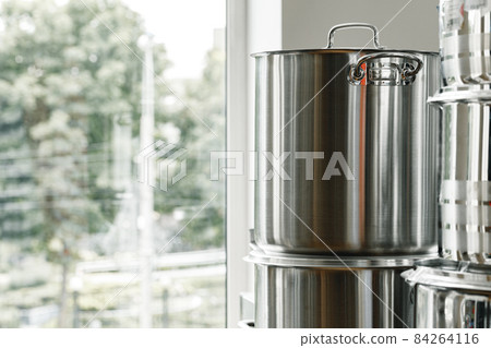 New industrial cooking pots on proffesional kitchen New industrial cooking pots on proffesional kitchen 84264116