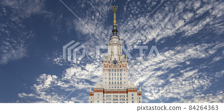 The Main building of Lomonosov Moscow State University on Sparrow Hills (on the background of the sky with clouds). It is the highest-ranking Russian educational institution. Russia The Main building of Lomonosov Moscow State University on Sparrow Hills (on the background of the sky with clouds). It is the highest-ranking Russian educational institution. Russia 84264363