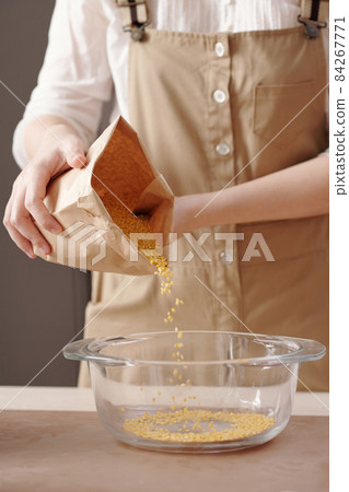Woman Making Sesame Seeds Filling Woman Making Sesame Seeds Filling 84267771