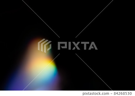 colorful rainbow crystal light leaks on black background 84268530