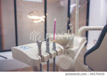 Close-up of dentist tools and equipment at a dental clinic, a tooth medical office, and medical tools Close-up of dentist tools and equipment at a dental clinic, a tooth medical office, and medical tools 84270420
