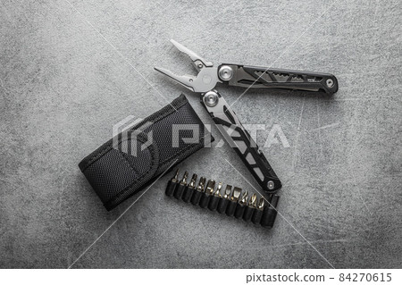 Multi-tools pliers with other tools and knife. Multifunction pliers. Multi-tools pliers with other tools and knife. Multifunction pliers. 84270615