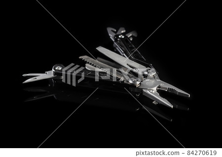 Multi-tools pliers with other tools and knife. Multifunction pliers. Multi-tools pliers with other tools and knife. Multifunction pliers. 84270619