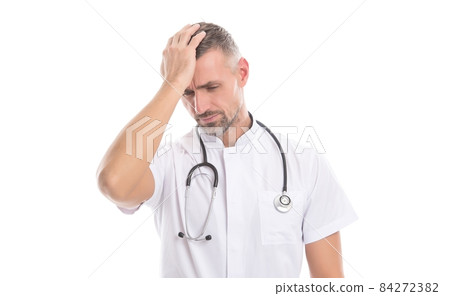 man family doctor or nurse with stethoscope isolated on white having headache, migraine and fever man family doctor or nurse with stethoscope isolated on white having headache, migraine and fever 84272382