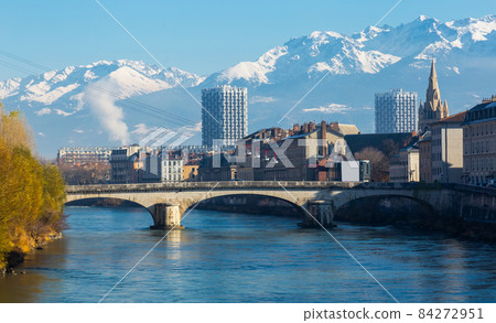 Cityscape of Grenoble with cable car and snowy Alps Cityscape of Grenoble with cable car and snowy Alps 84272951