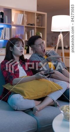 couple watch tv at home couple watch tv at home 84273083