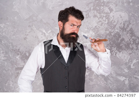 Making his beard perfect. Hair salon for men. Retro  84274397