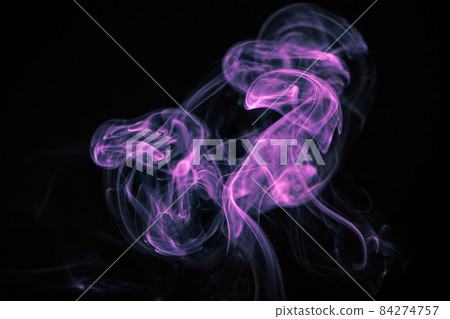Unusual purple smoke on a black background. 84274757
