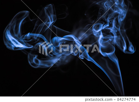 Beautiful blue smoke on a black background. Trend color of the year 84274774