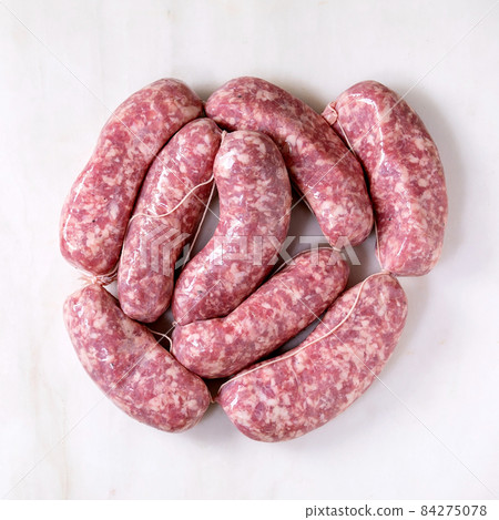 Bunch of raw uncooked italian sausages salsiccia 84275078
