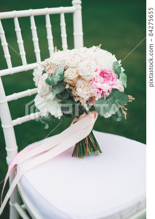 Wonderful luxury wedding bouquet of different flowers 84275655