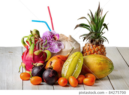 Tropical fruits on wooden table top view 84275700