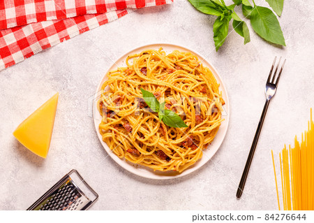 Homemade pasta with pancetta, egg, hard parmesan cheese and cream sauce Homemade pasta with pancetta, egg, hard parmesan cheese and cream sauce 84276644