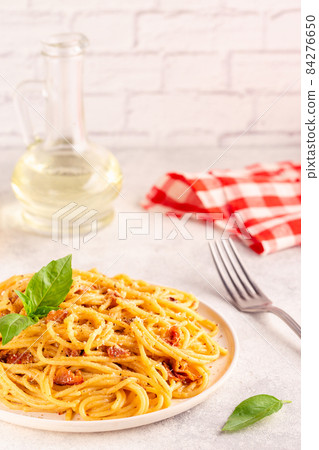 Homemade pasta with pancetta, egg, hard parmesan cheese and cream sauce Homemade pasta with pancetta, egg, hard parmesan cheese and cream sauce 84276650