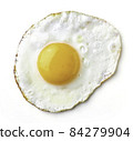 Fried egg isolated on white, from above 84279904