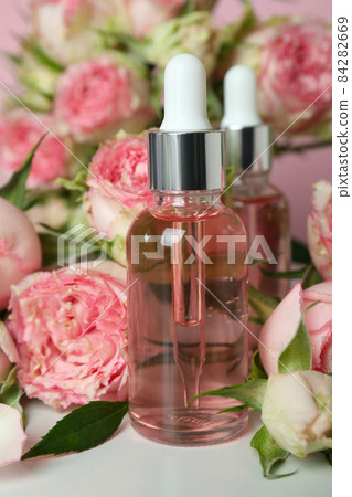Skin care concept with essential rose oil, close up 84282669