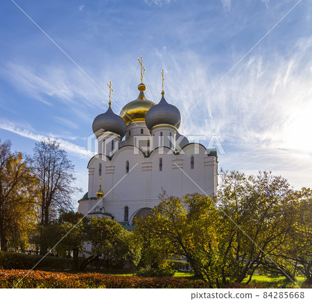 Novodevichy convent (Bogoroditse-Smolensky monastery) on a sunny autumn day. Cathedral of Our Lady of Smolensk (16th century). Moscow, Russia. UNESCO world heritage site Novodevichy convent (Bogoroditse-Smolensky monastery) on a sunny autumn day. Cathedral of Our Lady of Smolensk (16th century). Moscow, Russia. UNESCO world heritage site 84285668