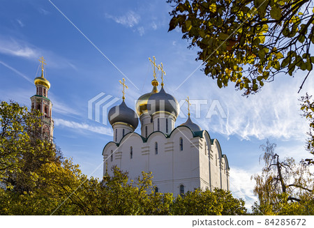 Novodevichy convent (Bogoroditse-Smolensky monastery) on a sunny autumn day. Cathedral of Our Lady of Smolensk (16th century). Moscow, Russia. UNESCO world heritage site Novodevichy convent (Bogoroditse-Smolensky monastery) on a sunny autumn day. Cathedral of Our Lady of Smolensk (16th century). Moscow, Russia. UNESCO world heritage site 84285672