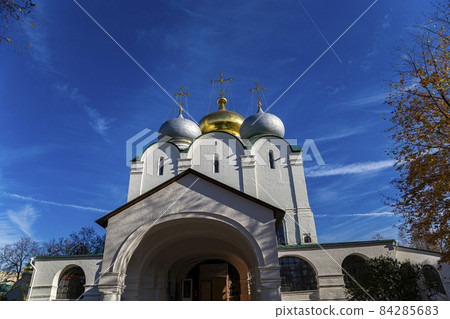 Novodevichy convent (Bogoroditse-Smolensky monastery) on a sunny autumn day. Cathedral of Our Lady of Smolensk (16th century). Moscow, Russia. UNESCO world heritage site Novodevichy convent (Bogoroditse-Smolensky monastery) on a sunny autumn day. Cathedral of Our Lady of Smolensk (16th century). Moscow, Russia. UNESCO world heritage site 84285683