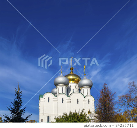 Novodevichy convent (Bogoroditse-Smolensky monastery) on a sunny autumn day. Cathedral of Our Lady of Smolensk (16th century). Moscow, Russia. UNESCO world heritage site 84285711