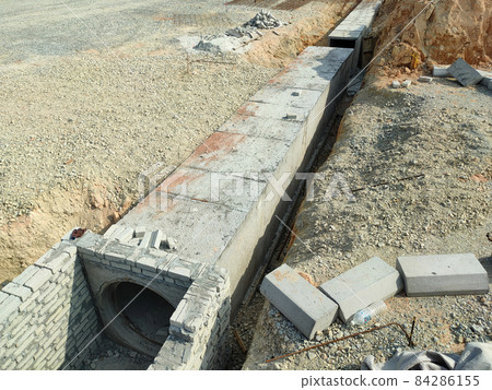 SELANGOR, MALAYSIA -JANUARY 22, 2021: Underground precast concrete box culvert drain under construction at the construction site. It is used to channel stormwater to prevent flash floods.  84286155