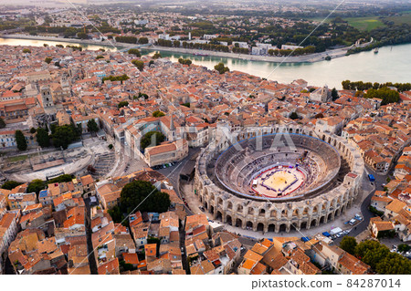 Aerial view of Arles on Rhone river overlooking Roman amphitheatre, France Aerial view of Arles on Rhone river overlooking Roman amphitheatre, France 84287014
