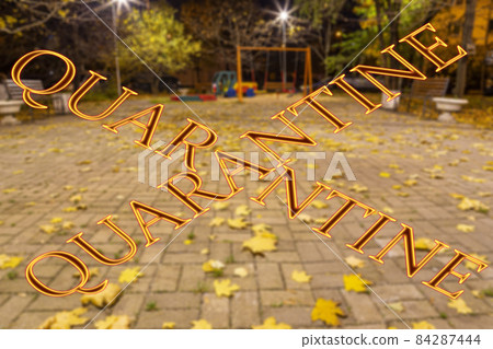Coronavirus in Moscow, Russia. An empty playground on an autumn night in one of the residential areas (blurry view). Quarantine sign. Concept of COVID pandemic and travel Coronavirus in Moscow, Russia. An empty playground on an autumn night in one of the residential areas (blurry view). Quarantine sign. Concept of COVID pandemic and travel 84287444