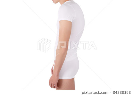 A man with an impaired posture, scoliosis defect and an ideal bearing. Man with bad posture on white background. A man with an impaired posture, scoliosis defect and an ideal bearing. Man with bad posture on white background. 84288398