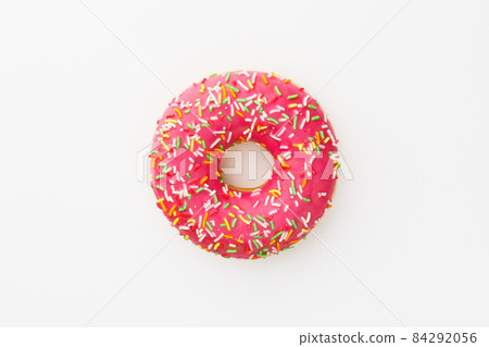 pink donut against white background 84292056