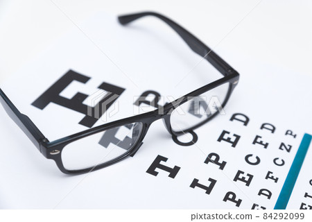 Glasses and Snellen's chart. Test eye examination 84292099