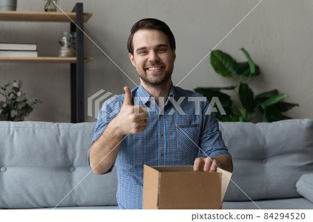Happy young man recommending fast delivery service. Happy young man recommending fast delivery service. 84294520