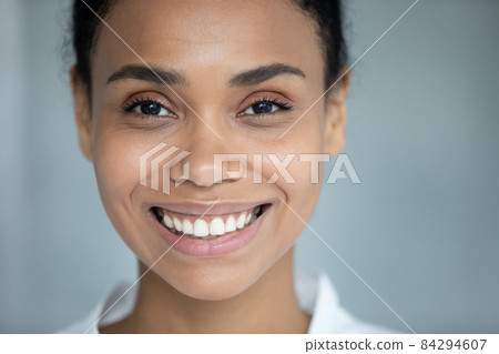 Close up portrait of african woman with perfect skin. Close up portrait of african woman with perfect skin. 84294607