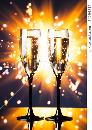 champagne glass against sparkler background 84294815