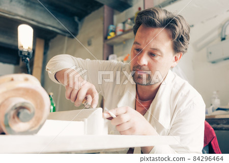 restorer making his work restorer making his work 84296464